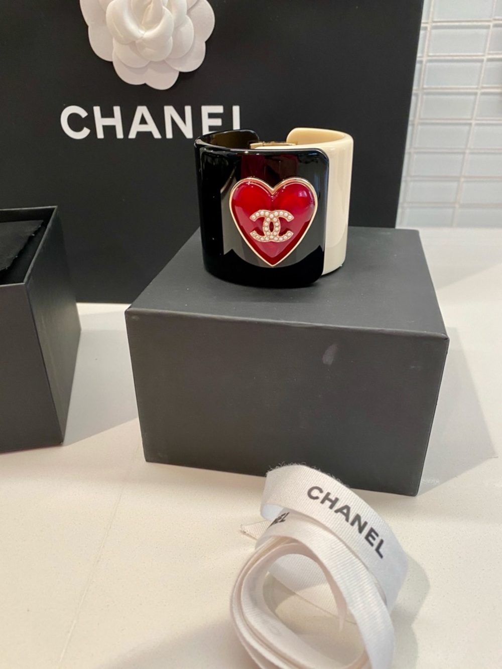 CHANEL Black and White Resin Cuff with Red Heart CC Accent - Picture 6 of 11
